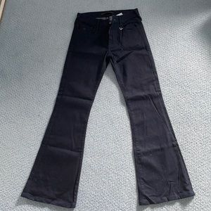 Joan Smalls x True Religion Mid Rise Dark Jeans